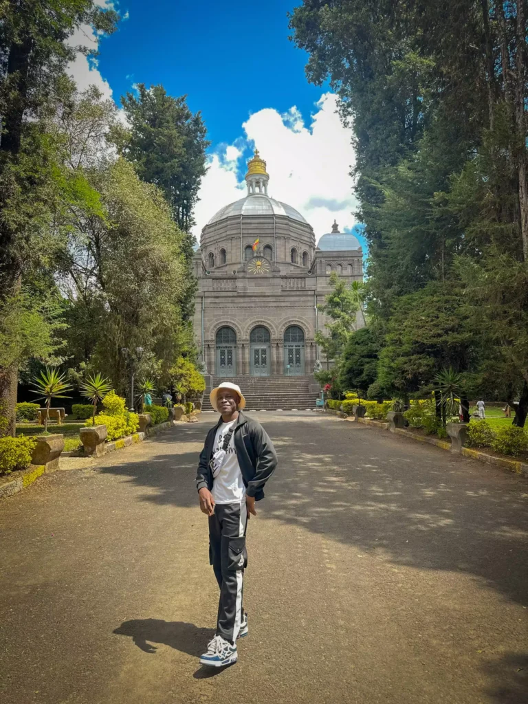 Lucky in front of Ba'etta Mariam Orthodox Church