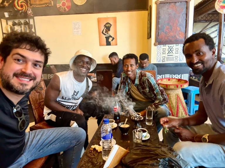 Lucky and local Ethiopians at a local restaurant in Addis Ababa enjoying local dishes