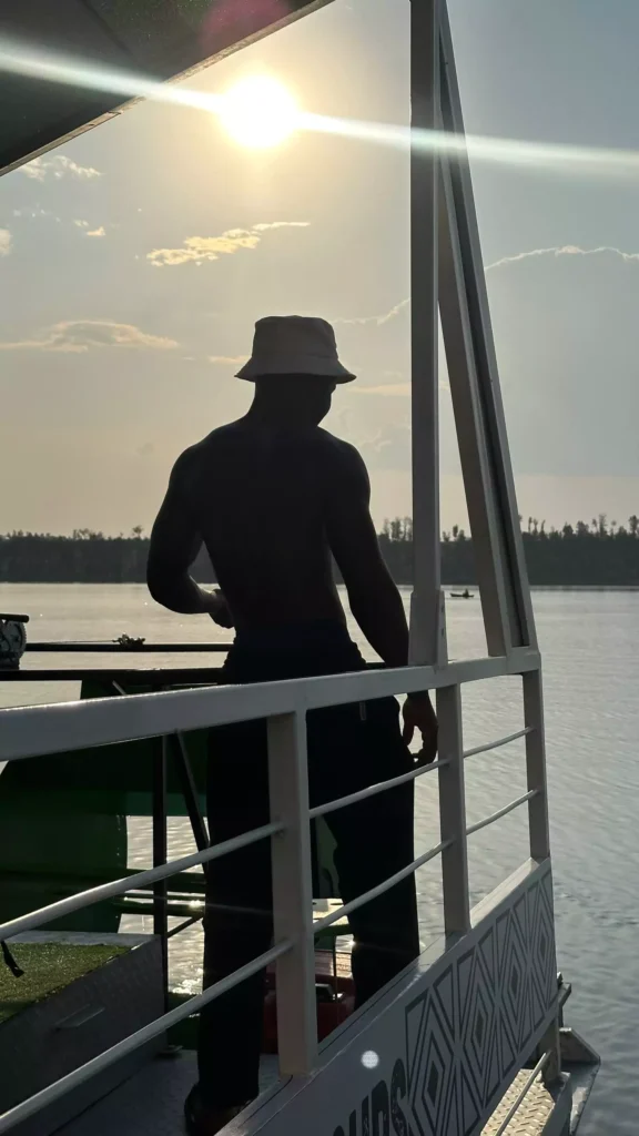 Lucky on a cruise in Lake Gashora