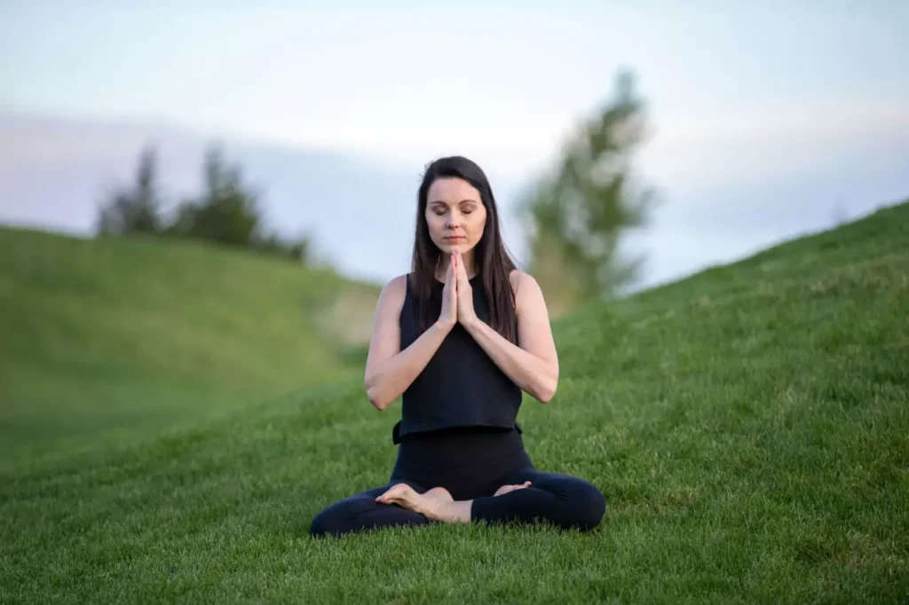 Woman meditating for calm mind