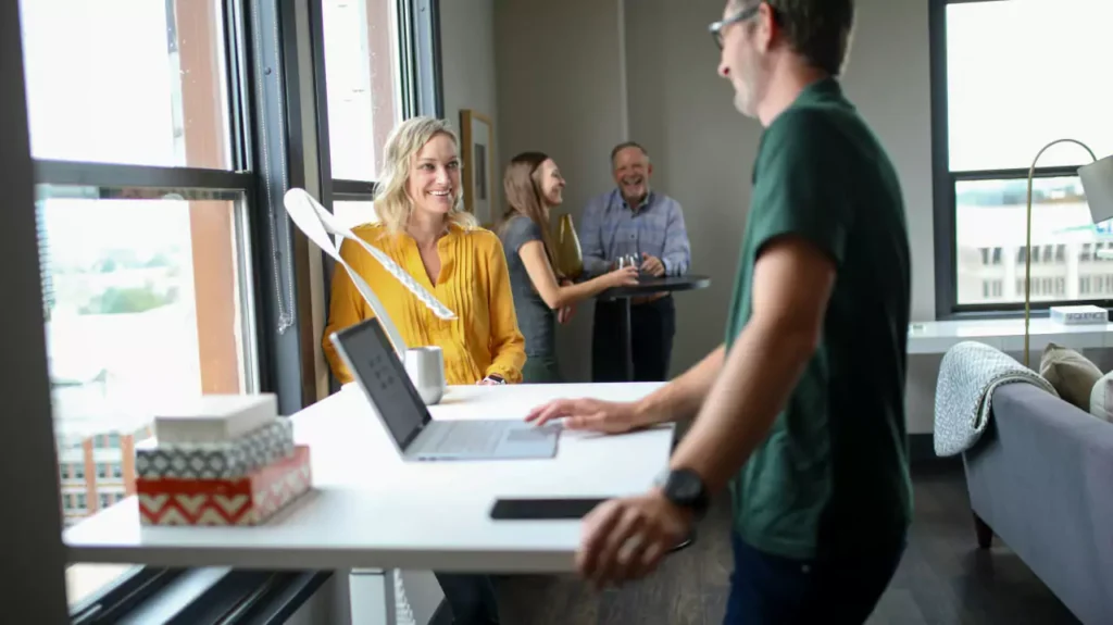 man and woman discussing skills that changes life