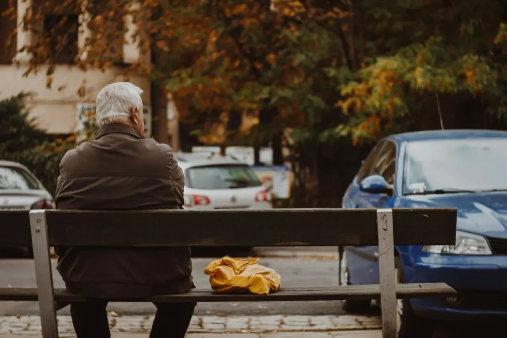 old man sitting on a bench