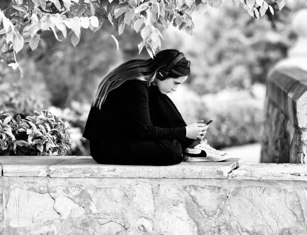 woman looking at her phone