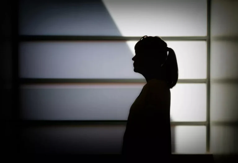 a woman in shadow